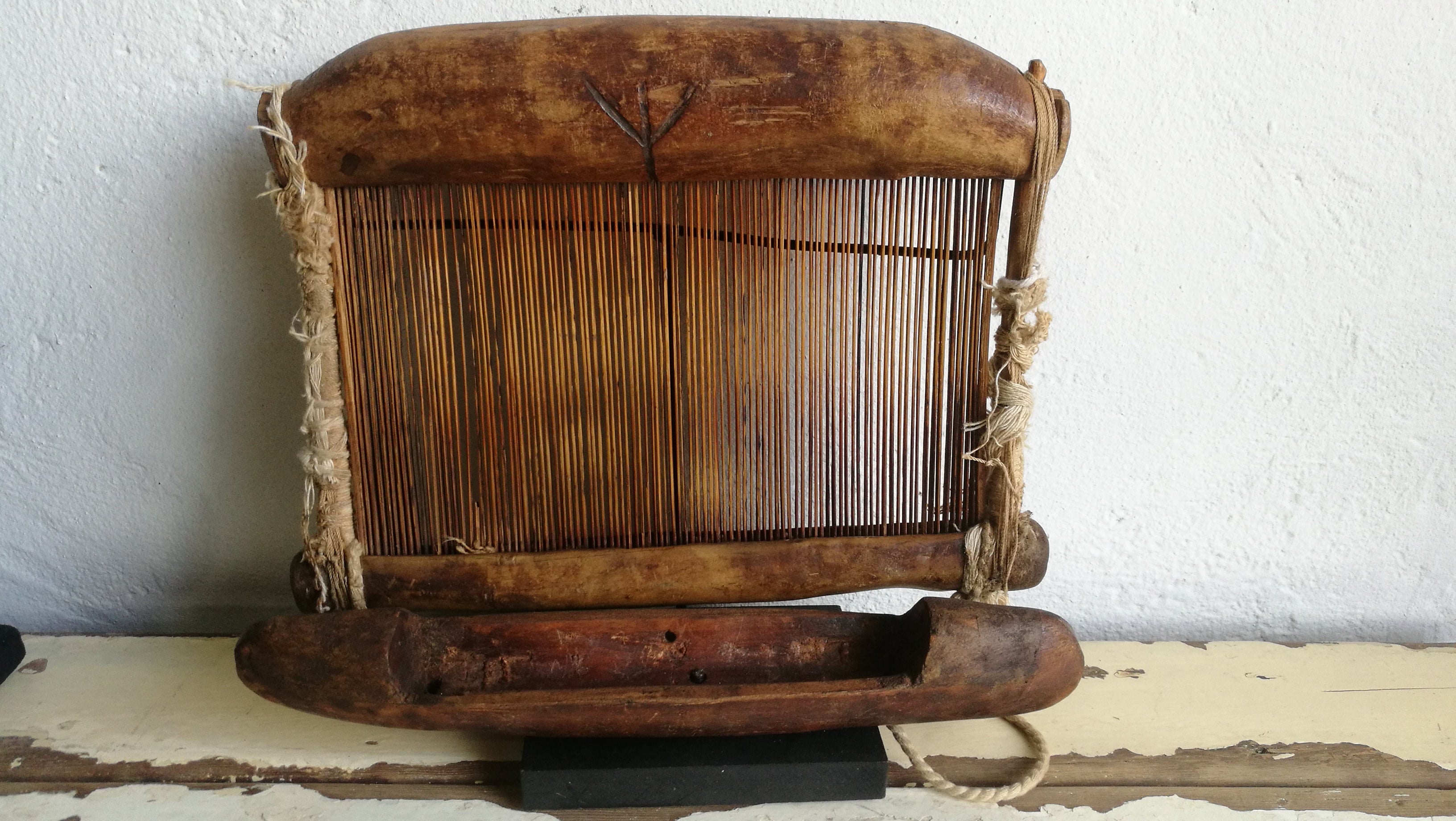 Weaving hand loom.